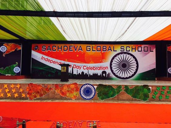 Patriotic school stage decorated for an Independence Day celebration